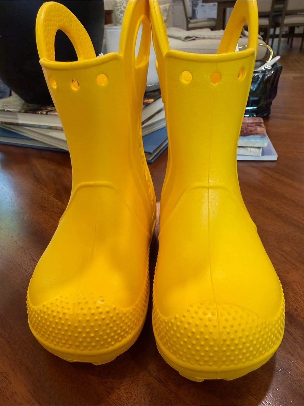 Crocs Kids' Handle It Rain Boots in vibrant yellow. Size 8